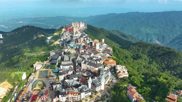 Aerial view of  Ba Na Hills, with beautiful castles, buildings, streets and campuses at the famous tourist destination of Da Nang, Vietnam. Near Golden bridge