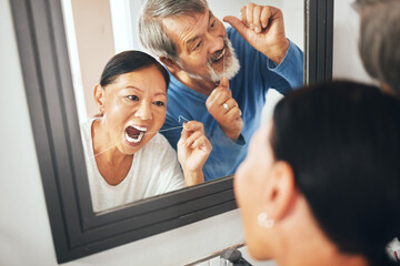 Old couple, flossing in mirror and dental in bathroom, hygiene and teeth whitening during morning...
