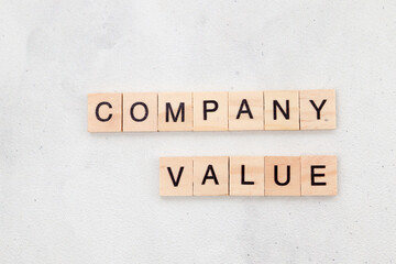 Top view of Company Value word on wooden cube letter block on white background. Business concept