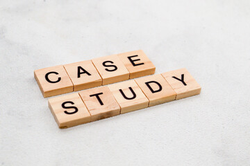 Top view of Case Study word on wooden cube letter block on white background. Business concept