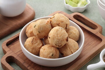Pempek, mpek-mpek and also known as colloquially as empek-empek is a savoury Indonesian fishcake delicacy, made of fish and tapioca, from Palembang, South Sumatera, Indonesia. 
