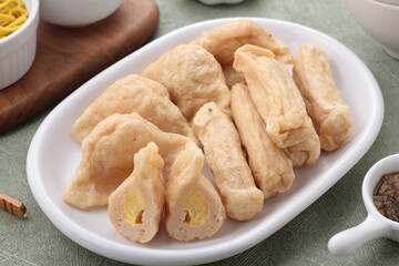 Pempek, mpek-mpek and also known as colloquially as empek-empek is a savoury Indonesian fishcake delicacy, made of fish and tapioca, from Palembang, South Sumatera, Indonesia. 