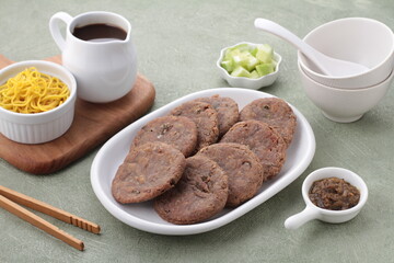 Pempek, mpek-mpek and also known as colloquially as empek-empek is a savoury Indonesian fishcake delicacy, made of fish and tapioca, from Palembang, South Sumatera, Indonesia. 