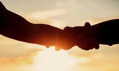 Outstretched hands, salvation, help silhouette, concept help. Giving a helping hand. Rescue,...