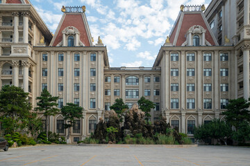 Fototapeta premium Luxury European style castle hotel architecture and plaza
