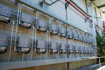 View of the installation of solar panels on a warehouse roof -green energy - renewable energy 