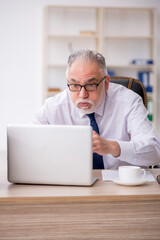 Old male employee and too much work in the office