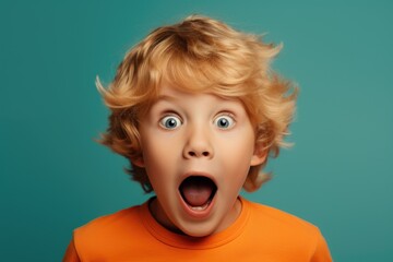 A young boy with a surprised expression on his face. Perfect for capturing genuine emotions and reactions. - obrazy, fototapety, plakaty