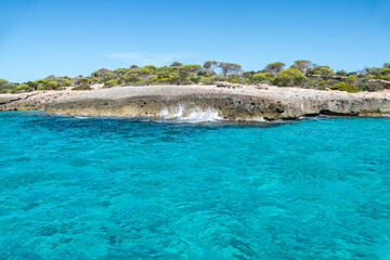 Cala Es Talaier is a small unspoiled and secluded beach located south of Ciutadella, Menorca.