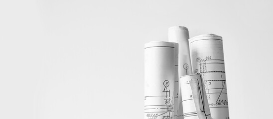 architect design working drawing sketch plans blueprints and making architectural construction model in architect studio,flat lay.