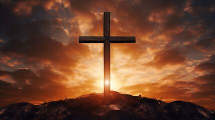 Wooden cross silhouette against a dramatic sunset sky on a hill, symbolizing hope and faith