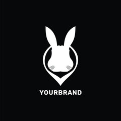elegant rabbit logo icon in white silhouette minimalist concept design vector business branding