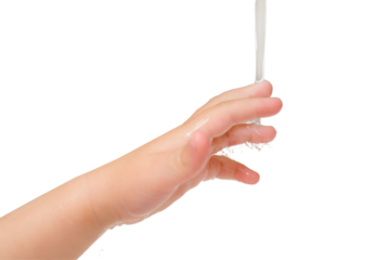 Close up of child's hand washing under running water in the bathroom, isolated on white background. Kid aged two years (two-year-old boy)