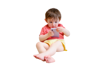 Toddler baby is tapping away on the mobile phone screen, isolated on white background. Kid aged about two years (one year ten months)