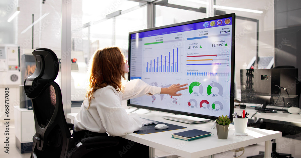 Poster analyst working with spreadsheet business data