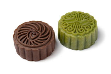 Green Snowskin and chocolate, new variations of moon cake for Mid-Autumn Festival isolated on white background close up
