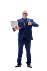 Old businessman holding laptop isolated on white