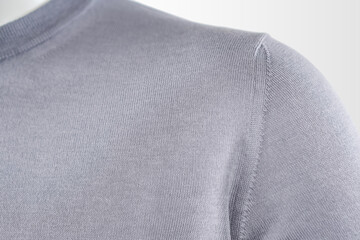 Gray men's sweater, details. Knitted tight-fitting jumper, long sleeve for male.