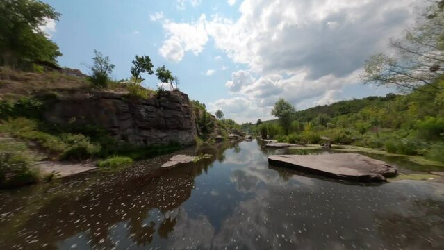 FPV, Ukrainian canyon in the village of Buki, Amazing aerial view of Buky canyon on a sunny day. Buka canyon on the Girsky Tikich river, Cherkasy region, Ukraine. Concept, travel, outdoor recreation, 