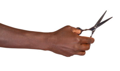 Hand holding scissors isolated on transparent or white background	