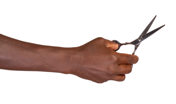 Hand holding scissors isolated on transparent or white background	