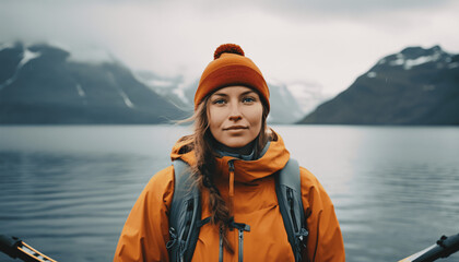 Norwegian girl in front of a lake