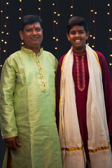 Father and son's celebrating diwali at home