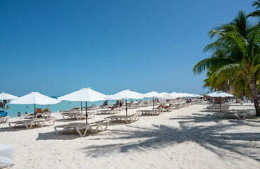 Paradise beach with white sand, beach bars and a great view on Cancun on isla mujeres, quintana roo, mexico