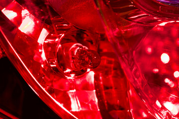 Crisp illumination of light bulb in red plastic