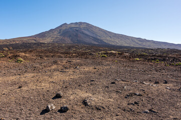 View of Mount Teide, Tenerife.  The highest point in Spain.  The brown  landscape is barran and...