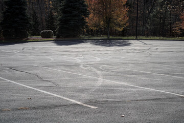 Well-worn pavement in parking lot