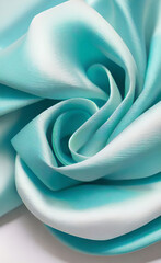 Abstract white and Turquoise textile transparent fabric. Soft light background for beauty products or other.