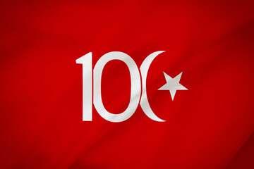 White 100 text on red waving flag with Turkish flag symbol. 100th anniversary of the founding of the Republic of Turkey.