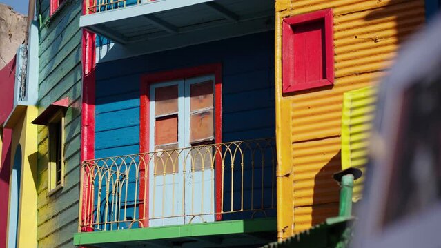 Buenos Aires, Argentina - October 2023: Tourists at Caminito, a street museum and a traditional alley located in the La Boca neighbourhood of Buenos Aires, Argentina.
