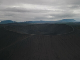 Huge inactive volcano with a cloudy moody sky