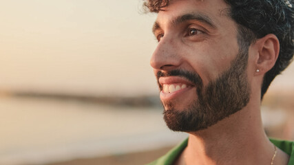 Fototapeta premium Close-up portrait of young guy talking to someone