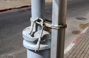 Thick hemp rope on the pier in the seaport.