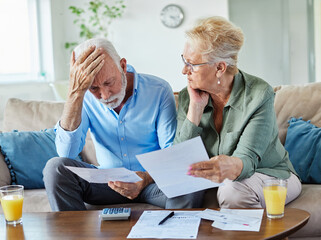woman man senior bill finance retirement couple home document calculator paper wife  budget elderly...
