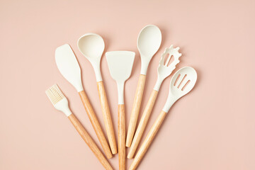 Pastel color kitchen utensils top view. Cooking blog, classes, workshop, recipe template concept