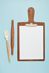 Obraz premium Pastel color kitchen utensils top view. Cooking blog, classes, workshop, recipe template concept