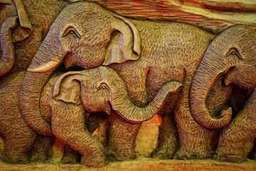 A wood carved elephants, Traditional Chinese style Dragon Abstract with Low Relief Technique.Wooden...