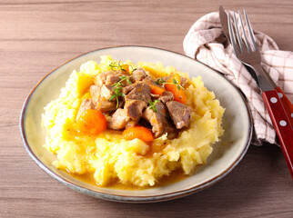 stew over mashed potatoes