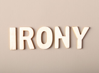 Irony - written with wooden letters