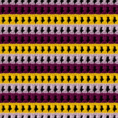 Seamless knitted texture in Greek style. The pattern is crocheted from multicolored cotton yarn. Imitation of balusters.