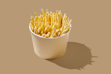 Maccheroni al Feretto noodle in bowl on brown pastel background