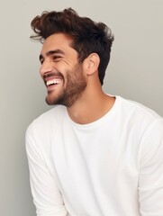 Obraz premium Happy european man in casual clothing against a neutral background