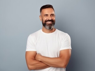 Happy european man in casual clothing against a neutral background