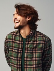 Obraz premium Happy european man in casual clothing against a neutral background
