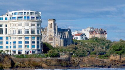 Biarritz view with Hotel Bellevue and Sainte Eugénie church in background - 658802634
