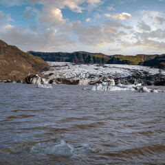 Solheimajokull picturesque glacier in southern Iceland. The tongue of this glacier slides from the...